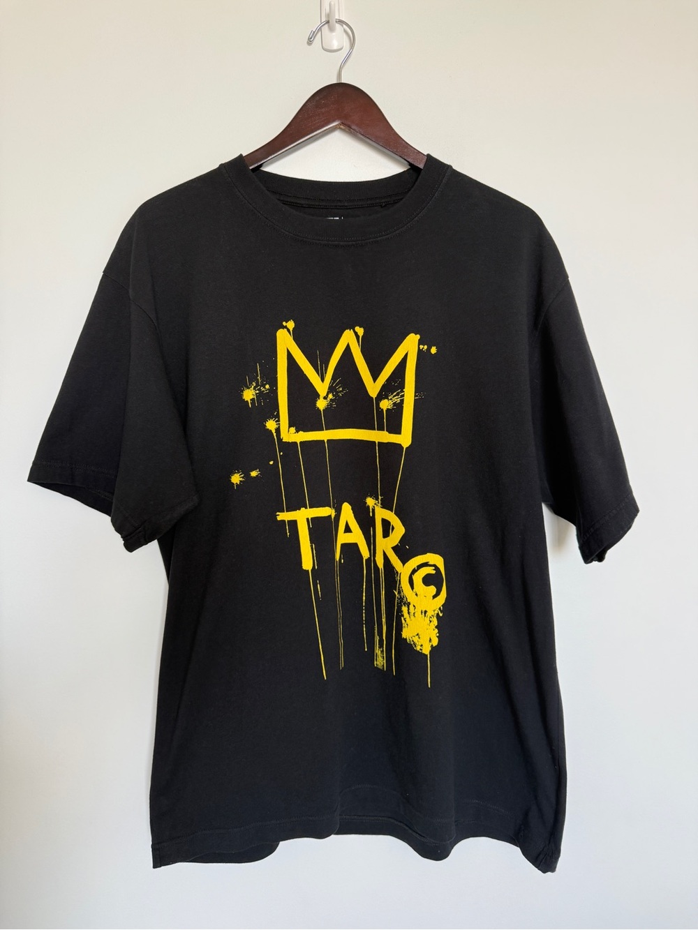 Uniqlo Black Tee with Yellow Crown Graphic